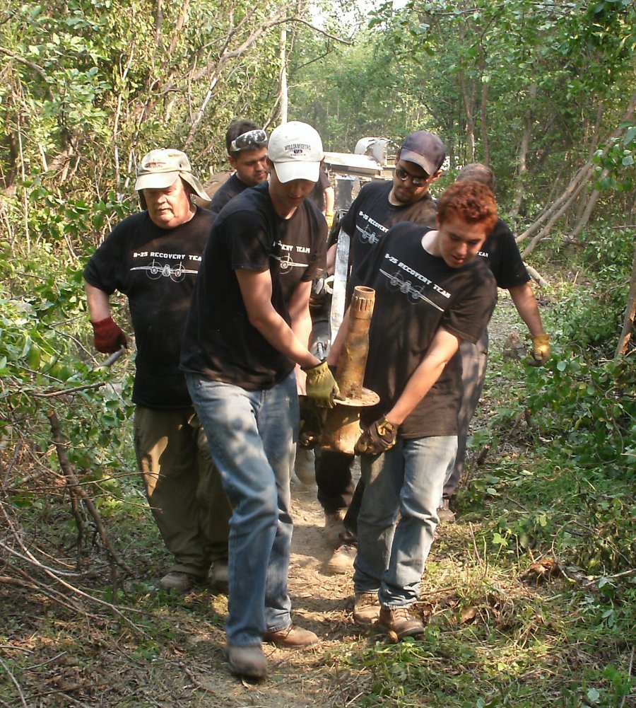 Volunteers recovering aircraft components